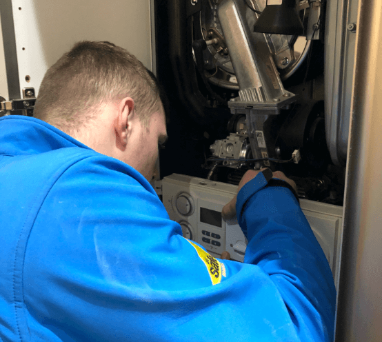 Celsius heating engineer undertaking a boiler repair and service.