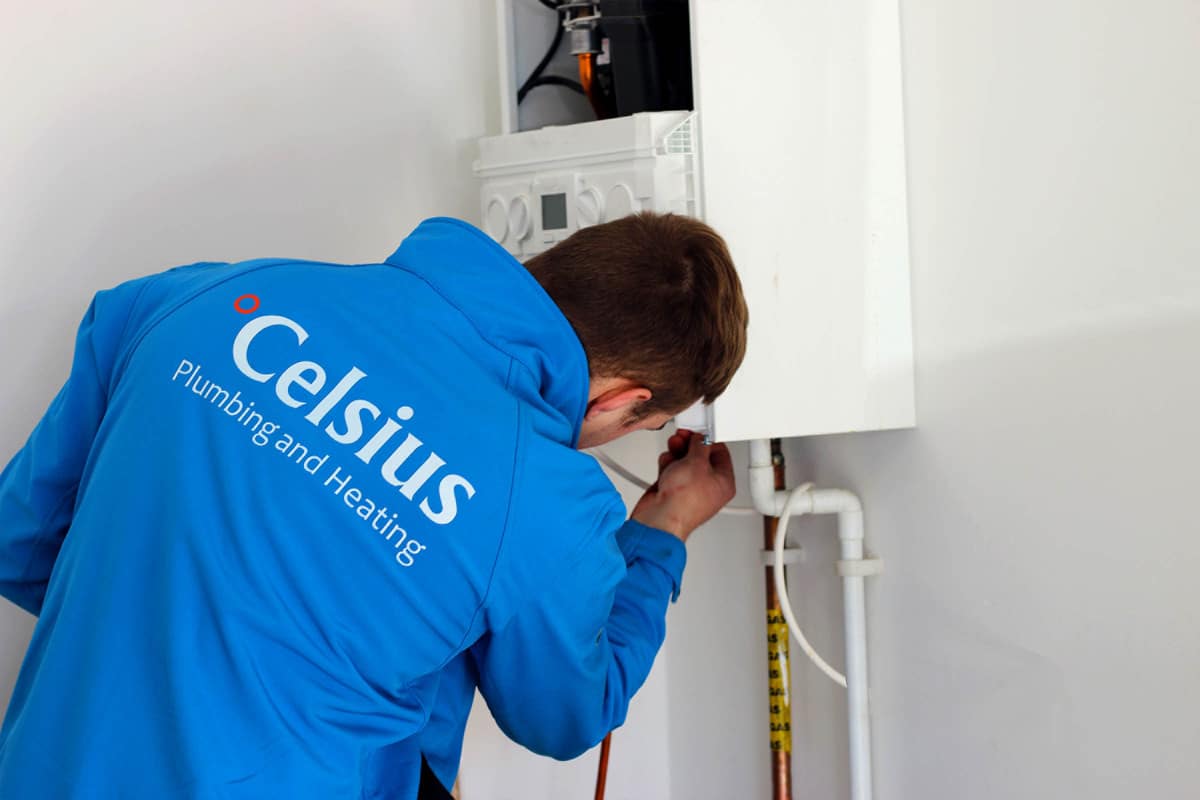 Celsius Gas Safe plumber repairing a boiler at an Edinburgh rental property.