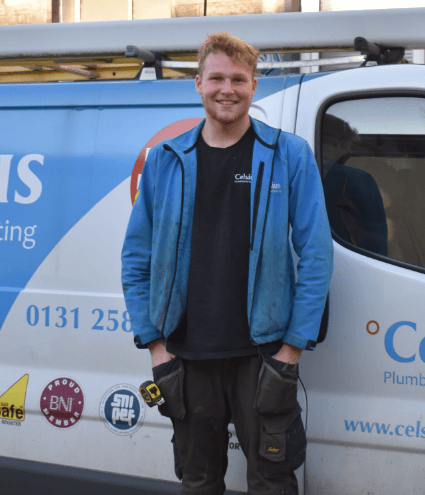 Celsius Plumber at his van in Edinburgh carrying out heating repairs and installations.