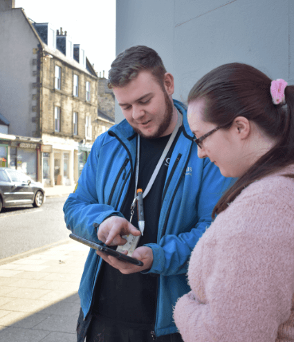 Celsius plumber explaining next steps with a customer in Edinburgh.