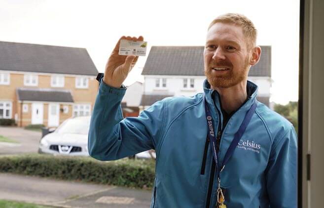 Central heating engineer arriving at an annual boiler service.