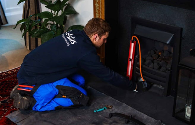 Gas fire in Edinburgh being serviced by a Celsius heating engineer.