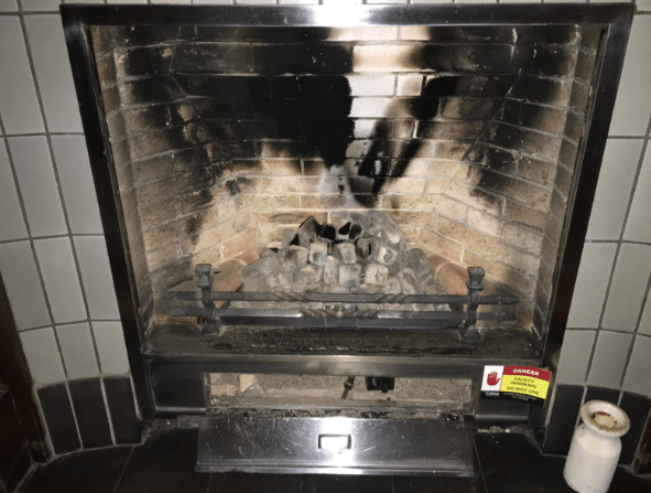 Gas fire showing signs of sooting up and needs repaired and serviced immediately.