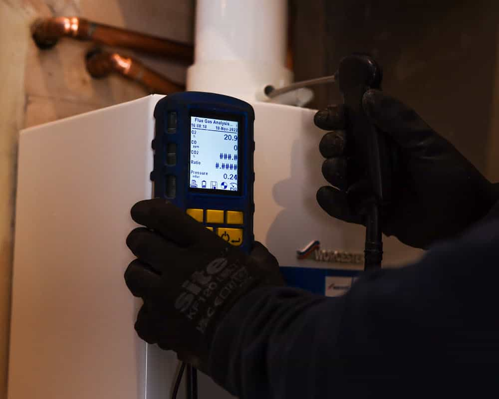 Gas flue analysis being completed as part of gas safety check in Edinburgh.