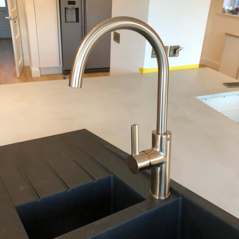 Fitting a lovely new kitchen mixer tap into an Edinburgh family home.