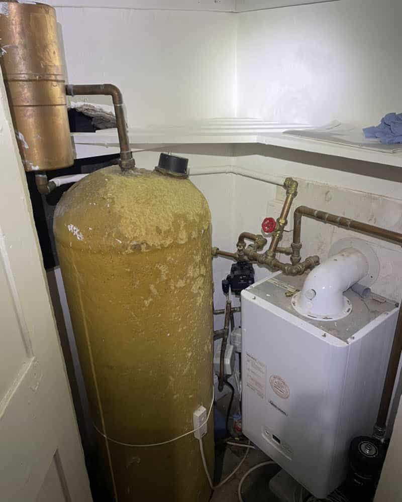 Gravity fed open vent hot water tank.