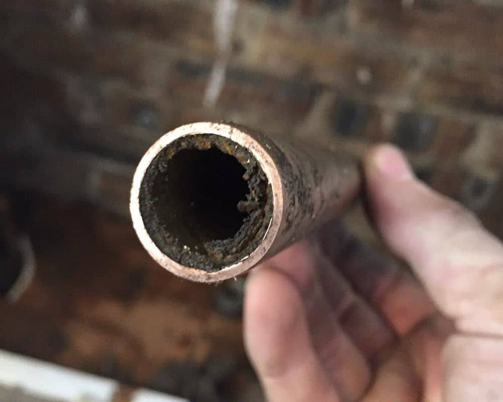 Sludge has built-up in the central heating pipes in this Edinburgh home.