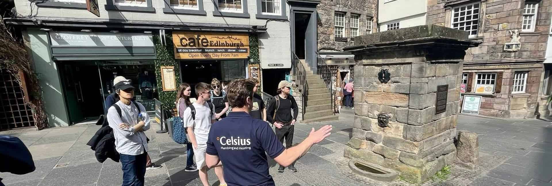 Michael taking visitors back in time on Plumbing History Tour in Edinburgh.
