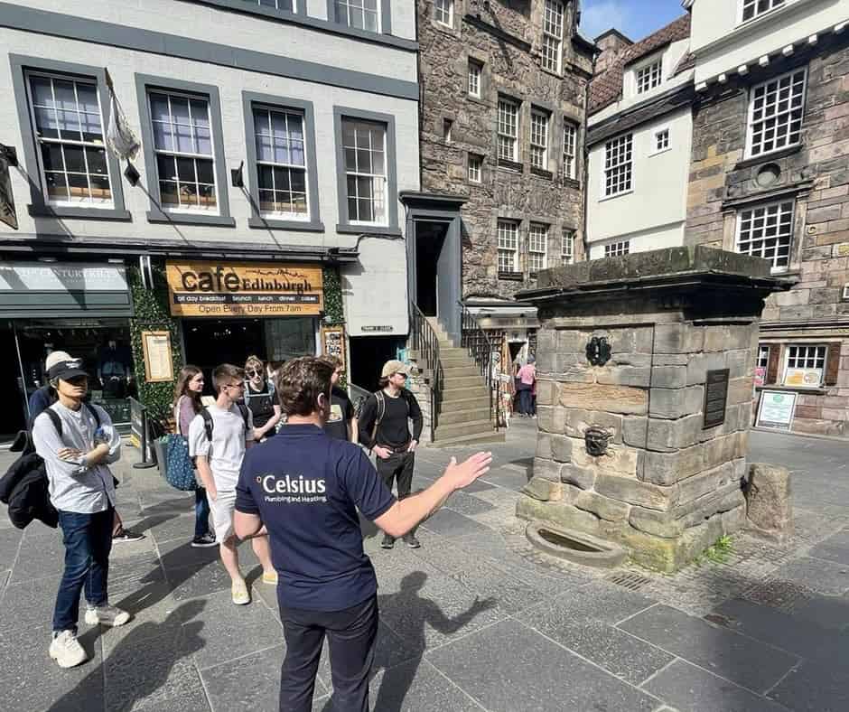 Michael taking visitors back in time on a Plumbing History Tour in Edinburgh.