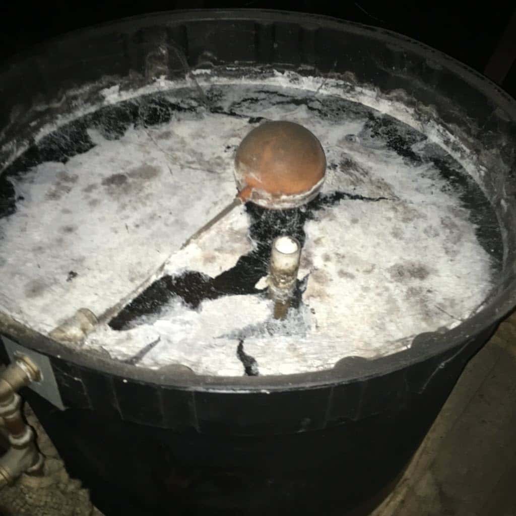This water storage tank needs cleaned and a Legionella test.