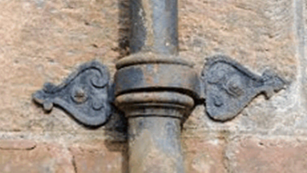 A Victorian era cast iron drainpipe.